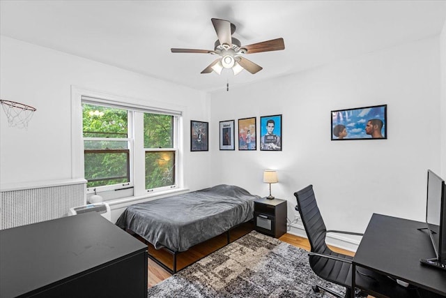 126 N Austin Blvd Unit 2N, Oak Park, IL 60302 - bedroom featuring light wood-style flooring, a desk, and ceiling fan