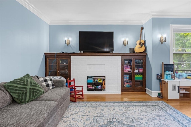 126 N Austin Blvd Unit 2N, Oak Park, IL 60302 - living area with wood finished floors, a brick fireplace, and ornamental molding
