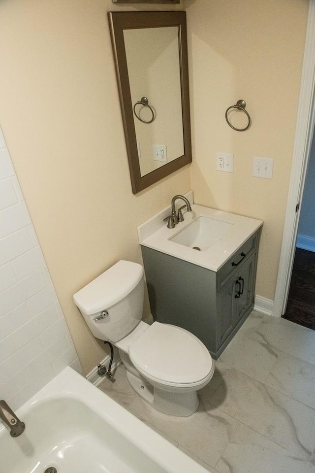 1028 Valley Stream Dr, Wheeling, IL 60090 - bathroom featuring vanity, a bath, and marble finish flooring