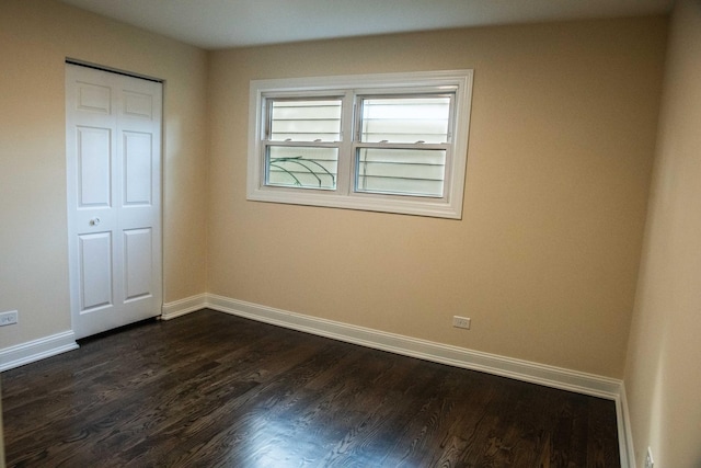 1028 Valley Stream Dr, Wheeling, IL 60090 - unfurnished bedroom with dark wood finished floors and baseboards