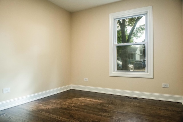 1028 Valley Stream Dr, Wheeling, IL 60090 - unfurnished room featuring dark wood-style flooring and baseboards