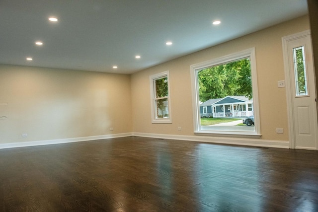 1028 Valley Stream Dr, Wheeling, IL 60090 - spare room with plenty of natural light, dark wood-type flooring, and recessed lighting