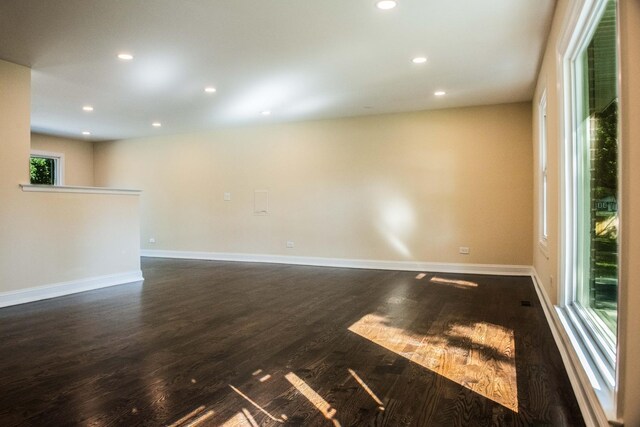 1028 Valley Stream Dr, Wheeling, IL 60090 - spare room featuring dark wood-type flooring and recessed lighting