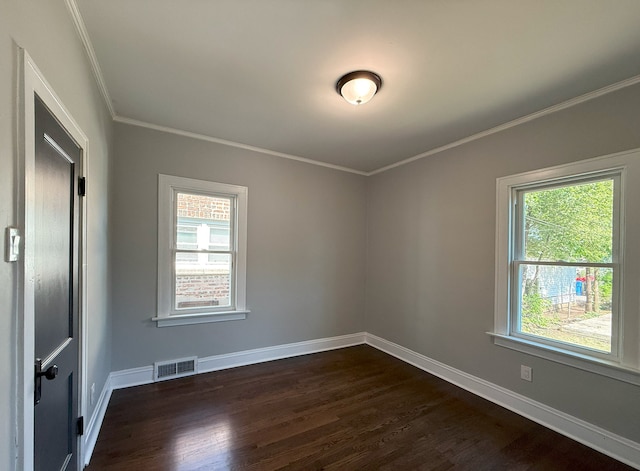 30 E 102nd St, Chicago, IL 60628 - empty room with dark wood-type flooring and ornamental molding