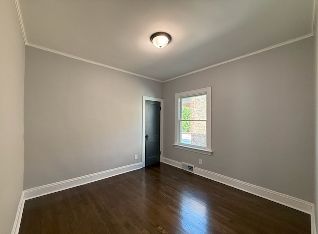 30 E 102nd St, Chicago, IL 60628 - empty room featuring dark wood-style floors and ornamental molding