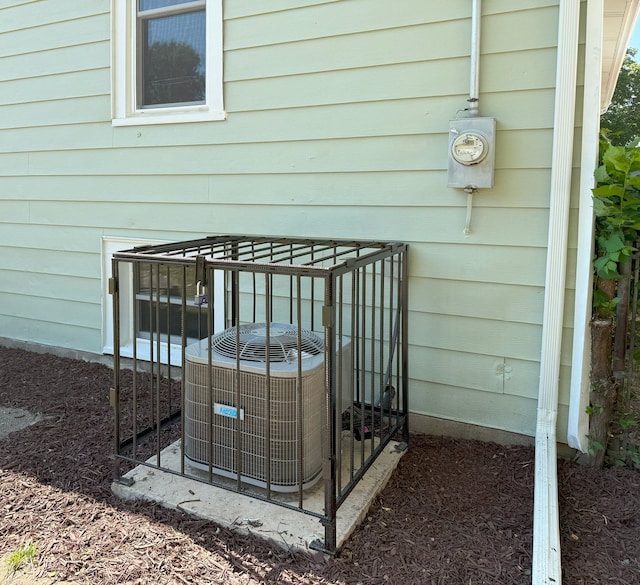 30 E 102nd St, Chicago, IL 60628 - exterior view of a central air condition unit and electric meter