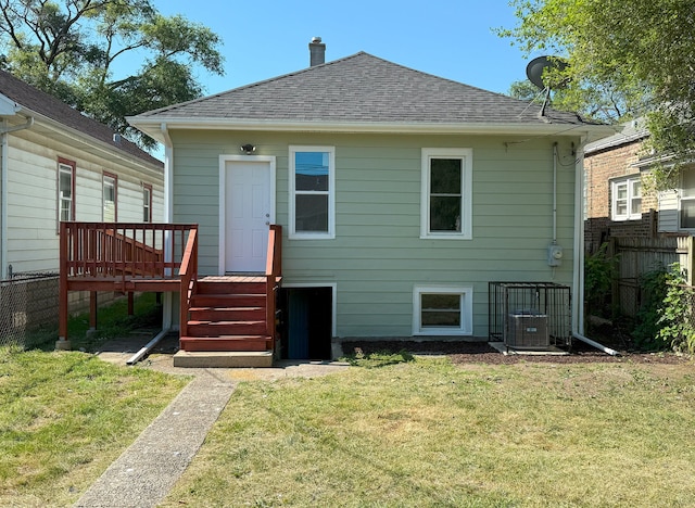 30 E 102nd St, Chicago, IL 60628 - rear view of property with a shingled roof and a deck