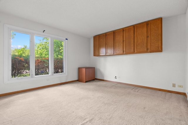739 Crest Ave, Schaumburg, IL 60193 - spare room featuring light colored carpet and baseboards
