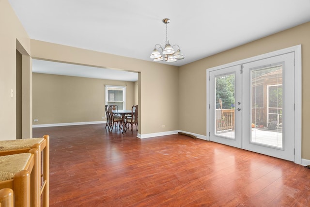 739 Crest Ave, Schaumburg, IL 60193 - spare room with a chandelier and wood finished floors