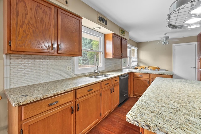 739 Crest Ave, Schaumburg, IL 60193 - kitchen featuring stainless steel dishwasher, dark wood-style flooring, backsplash, ceiling fan, and light stone counters