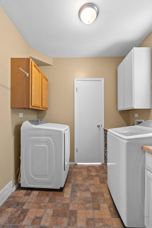 739 Crest Ave, Schaumburg, IL 60193 - washroom featuring cabinet space and baseboards