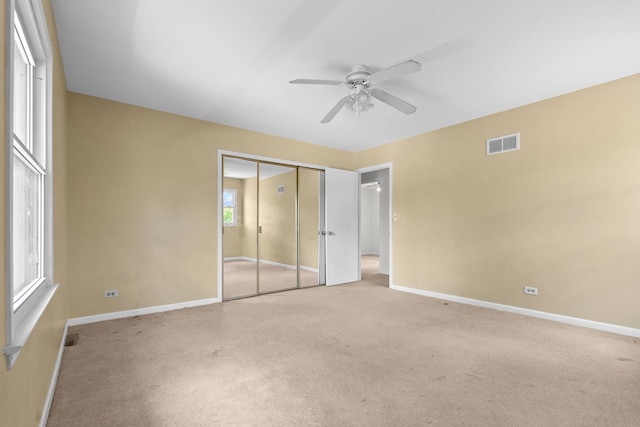 739 Crest Ave, Schaumburg, IL 60193 - unfurnished bedroom featuring light carpet, ceiling fan, and a closet