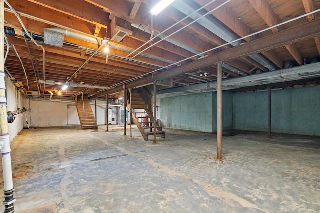 739 Crest Ave, Schaumburg, IL 60193 - unfinished below grade area featuring stairway and gas water heater