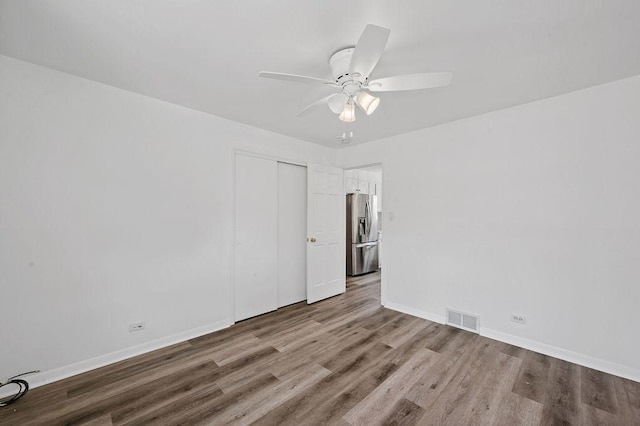 7826 S Kenneth Ave, Chicago, IL 60652 - empty room featuring wood finished floors and a ceiling fan