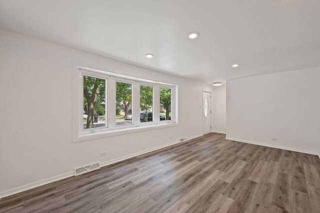 7826 S Kenneth Ave, Chicago, IL 60652 - unfurnished room featuring wood finished floors and recessed lighting