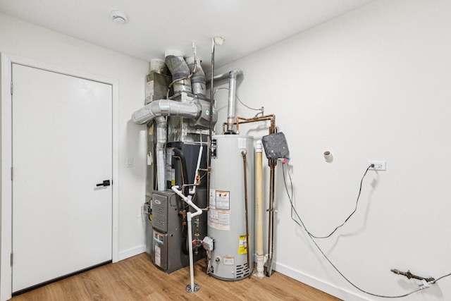 1516 Laguna Ct, Wheeling, IL 60090 - utility room featuring gas water heater and heating unit