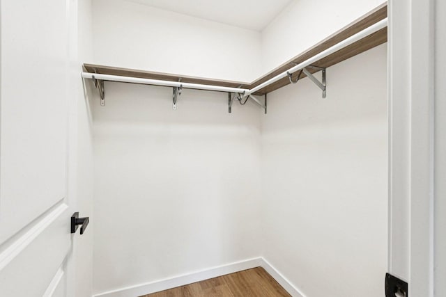 1516 Laguna Ct, Wheeling, IL 60090 - spacious closet featuring light wood-style flooring
