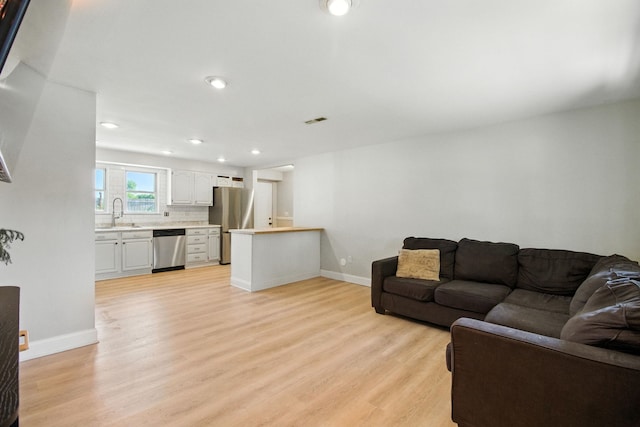 34W928 N James Dr, Saint Charles, IL 60174 - living room with light wood-style floors and recessed lighting