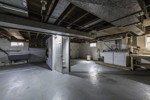 10415 W Ames Ave, Beach Park, IL 60087 - below grade area featuring washing machine and dryer and a sink
