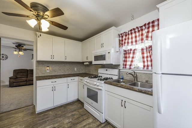 10415 W Ames Ave, Beach Park, IL 60087 - kitchen with white appliances, dark countertops, tasteful backsplash, and a ceiling fan