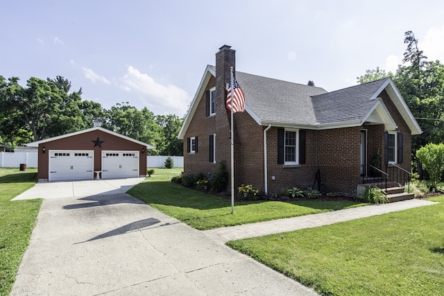 10415 W Ames Ave, Beach Park, IL 60087 - view of front of property with a detached garage, roof with shingles, an outbuilding, brick siding, and a chimney