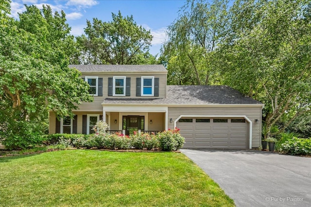 515 Timbers Trl, Saint Charles, IL 60174 - traditional-style home with an attached garage, asphalt driveway, and a front lawn