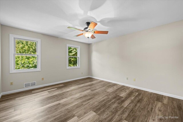 515 Timbers Trl, Saint Charles, IL 60174 - spare room featuring wood finished floors and a ceiling fan