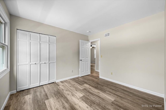 515 Timbers Trl, Saint Charles, IL 60174 - unfurnished bedroom with wood finished floors and a closet