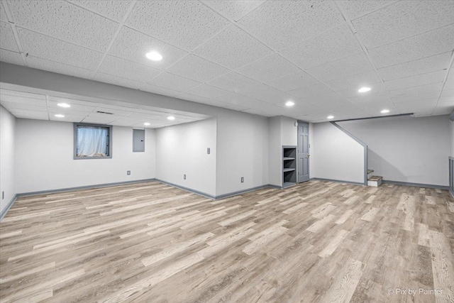 515 Timbers Trl, Saint Charles, IL 60174 - finished below grade area with electric panel, wood finished floors, recessed lighting, stairs, and a drop ceiling