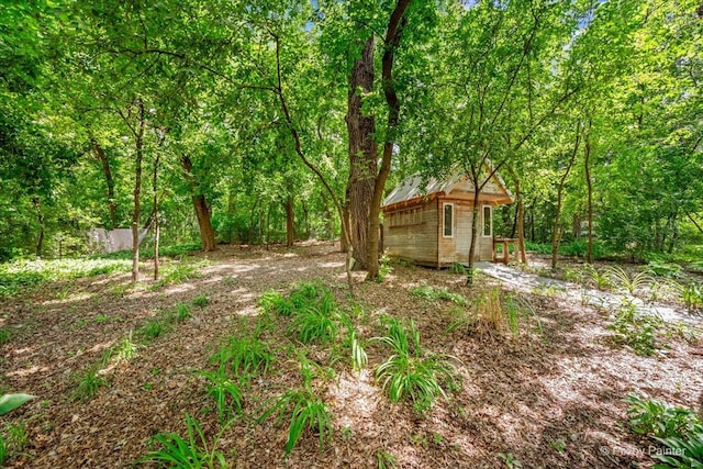 515 Timbers Trl, Saint Charles, IL 60174 - view of yard with an outbuilding and a wooded view