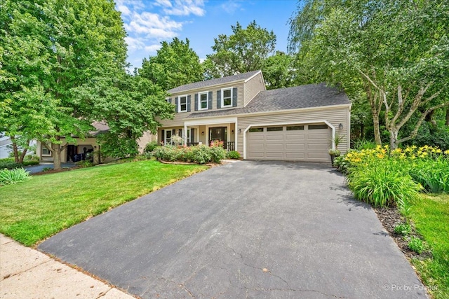 515 Timbers Trl, Saint Charles, IL 60174 - view of front facade with a garage, driveway, and a front yard