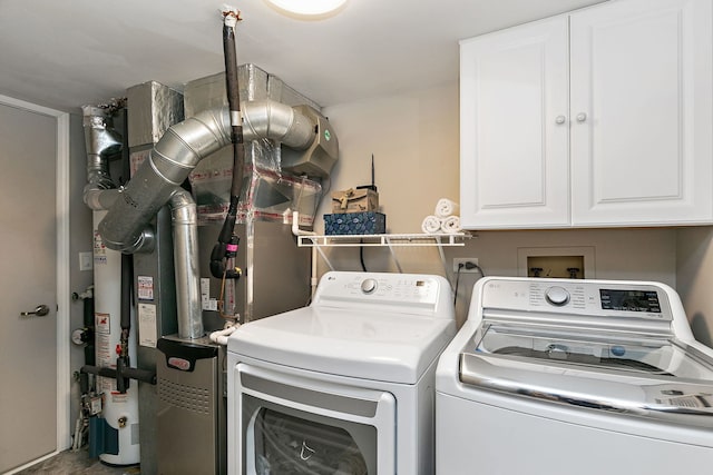 322 Winfield Ct, Schaumburg, IL 60194 - laundry room with separate washer and dryer and cabinet space