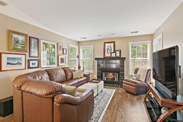 322 Winfield Ct, Schaumburg, IL 60194 - living room with a fireplace and hardwood / wood-style floors