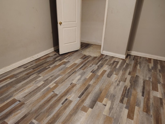 8924 S Paulina St, Chicago, IL 60620 - unfurnished bedroom featuring wood finished floors and a closet