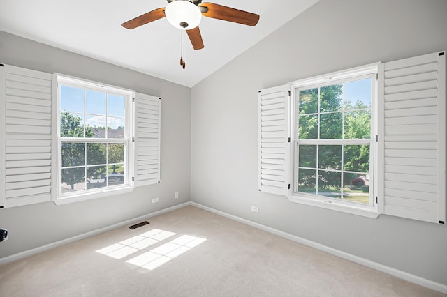 7358 Grandview Ct Unit 7358, Carpentersville, IL 60110 - empty room with healthy amount of natural light, lofted ceiling, carpet, and ceiling fan