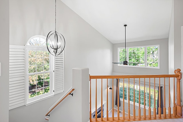 7358 Grandview Ct Unit 7358, Carpentersville, IL 60110 - stairway with a chandelier and lofted ceiling
