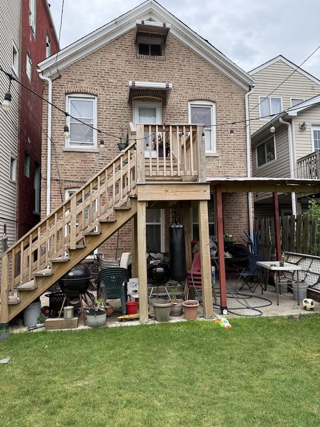1720 W 17th St, Chicago, IL 60608 - rear view of property with brick siding, stairs, a lawn, and a patio area