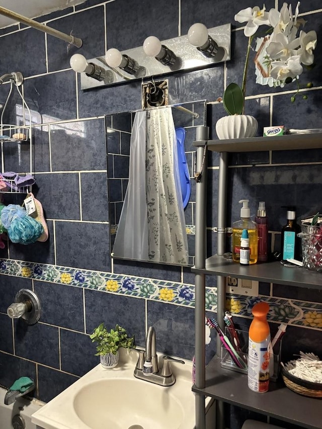 5409 S Richmond St, Chicago, IL 60632 - bathroom with a sink and decorative backsplash