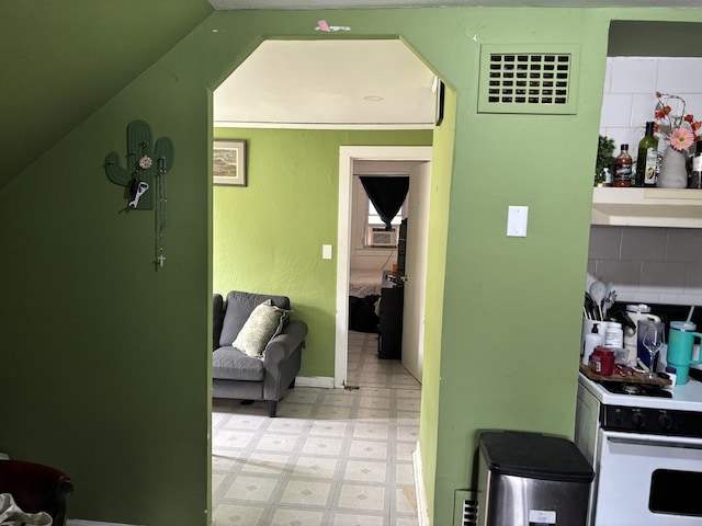 5409 S Richmond St, Chicago, IL 60632 - kitchen with light floors, white range, and cooling unit