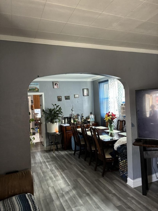 5409 S Richmond St, Chicago, IL 60632 - dining room with ornamental molding, arched walkways, and wood finished floors