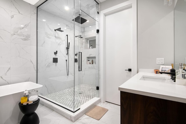 2441 N Clybourn Ave Unit 1, Chicago, IL 60614 - full bathroom featuring marble finish flooring, a marble finish shower, vanity, and a freestanding bath