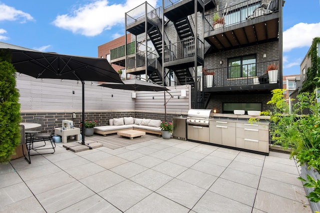 2441 N Clybourn Ave Unit 1, Chicago, IL 60614 - view of patio with exterior kitchen, stairs, and an outdoor living space