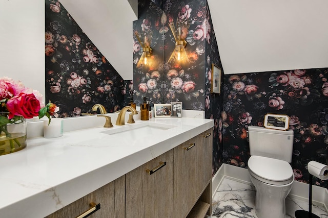 2441 N Clybourn Ave Unit 1, Chicago, IL 60614 - bathroom with vanity and wallpapered walls