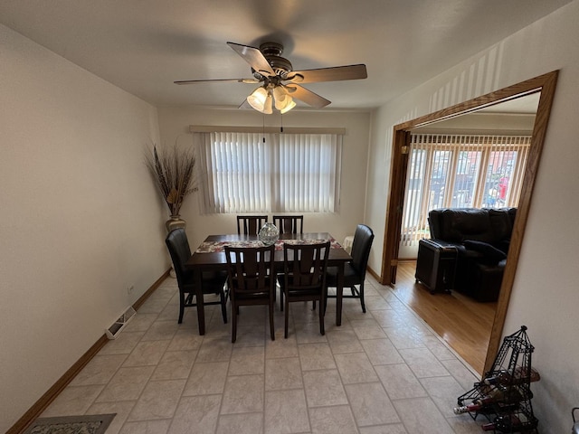 11117 S S Ave L, Chicago, IL 60617 - dining room with ceiling fan and plenty of natural light