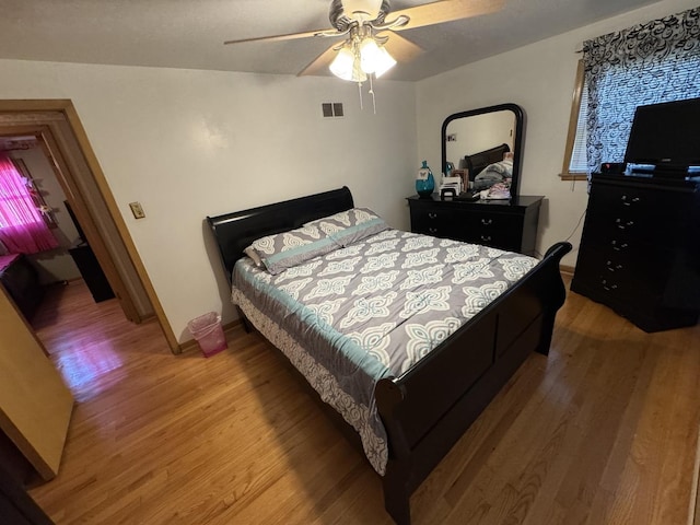 11117 S S Ave L, Chicago, IL 60617 - bedroom featuring light wood-type flooring and ceiling fan