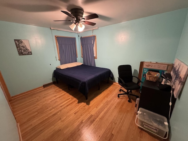 11117 S S Ave L, Chicago, IL 60617 - bedroom featuring light wood-type flooring and a ceiling fan
