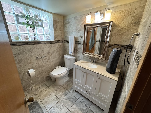 11117 S S Ave L, Chicago, IL 60617 - bathroom with tile walls, vanity, tile patterned flooring, and decorative backsplash