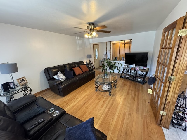 11117 S S Ave L, Chicago, IL 60617 - living area with a ceiling fan and light wood-style floors
