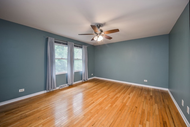 339 Windsor Dr, Bartlett, IL 60103 - empty room with a ceiling fan and light wood-style floors