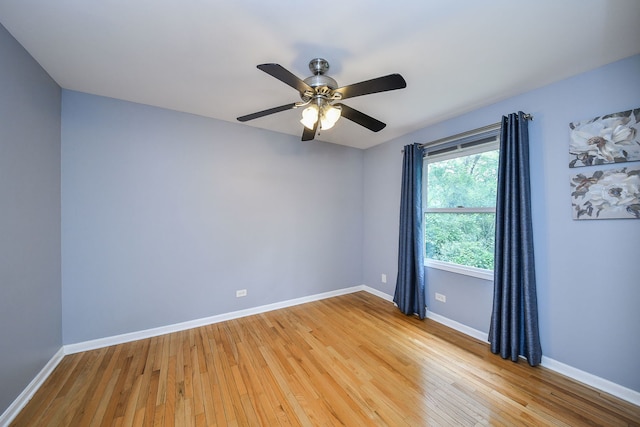 339 Windsor Dr, Bartlett, IL 60103 - empty room with light wood finished floors and ceiling fan